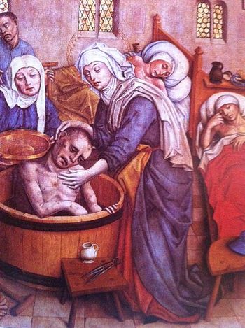 St. Elizabeth washing a sick man a scene from the main altar of St. Elisabeth Cathedral in Kassa, 15th century - Copy.jpg